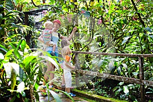 Family hiking in jungle.