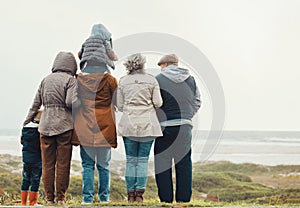 Family hiking outdoor, generations at beach together with nature view and back, spending quality time in winter