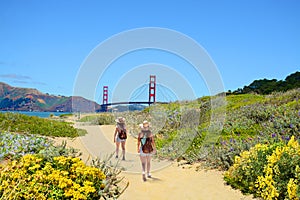 Family on a hiking trip enjoying beautiful coastal landscape.