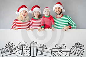 Family holding cardboard banner blank