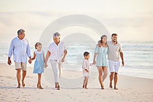 Family, holding hands and walk on beach, generations and people travel together, grandparents and parents with kids