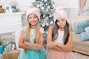 Family holiday. Cute little children girl with xmas present. happy little girls sisters celebrate winter holiday
