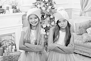 Family holiday. Cute little children girl with xmas present. happy little girls sisters celebrate winter holiday
