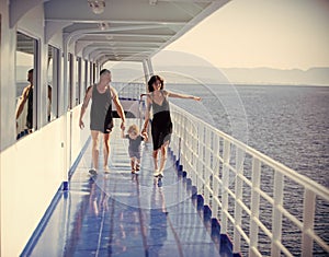 Family holiday. Happy family with cute son on summer vacation. Family travelling on cruise ship on sunny day. Family