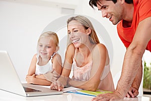 Family, home and laptop with laugh for child development with video, movie and news for entertainment with fun. Dad, mom