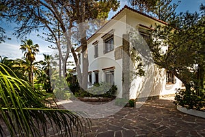 Family home with swimming pool and lawn