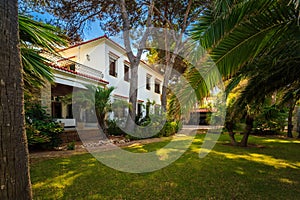 Family home with swimming pool and lawn