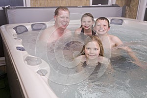 Family in hot tub