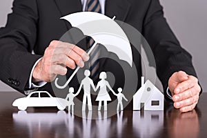 Family, house and car insurance concept