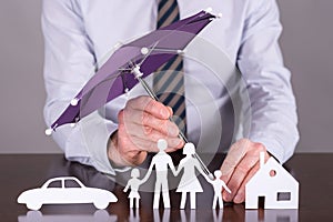 Family, house and car insurance concept