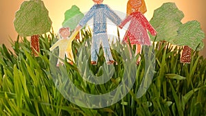 Family and House drawn icon on Grass green summer background.