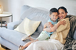 Family, hug and portrait of boy child with mother on a sofa happy, bond and relax at home together. Love, smile and face