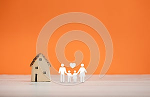 family icon and home model on orange color background