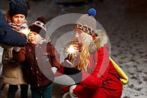 Family ignited sparklers in Christmas