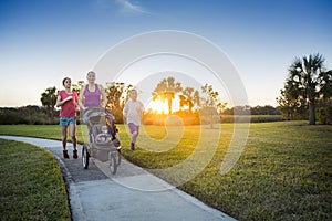 Family jogging and exercising outdoors together