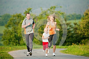 Family jogging outdoors