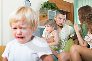 Family with kids having quarrel