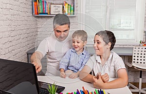 Family with kids shopping or watching video online. Video conference