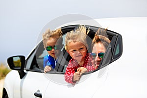 Family with kids travel by car