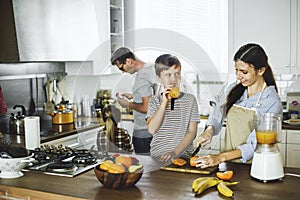 Family in the kitchen together