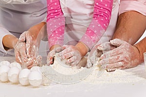 Family kneading dough