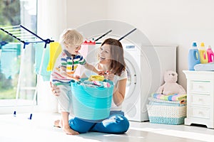 Family in laundry room with washing machine