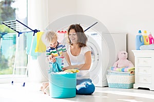 Family in laundry room with washing machine