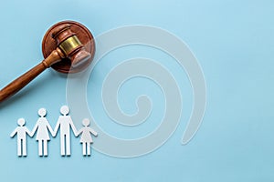 Family law or divorce concept. Family figure with judge gavel, top view