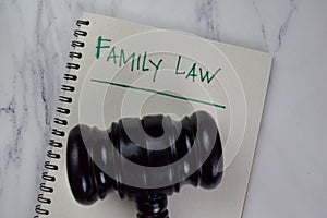 Family Law write on a book isolated on Wooden Table