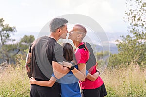 family looking landscape after sports