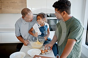 Family, love and cooking with a girl, father and grandfather baking together in the kitchen of their home. Food