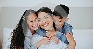 Family, love and surprise with children hugging mom in bedroom of home together for playful bonding. Portrait, smile or