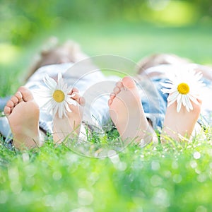 Family lying on grass