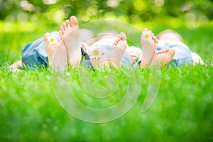 Family lying on grass