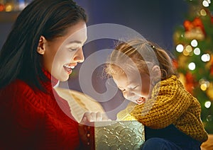 Family with magic gift box