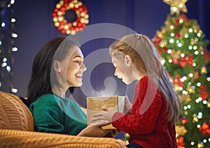 Family with magic gift box