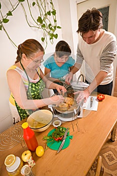 The family makes a supper.