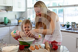 Family making Christmas cookies at home