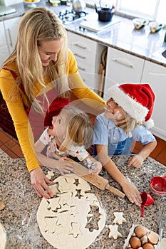 Family making Christmas cookies at home