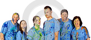 Family making faces after a paint fight