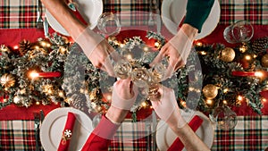 Family making a toast champagne to celebrate Christmas