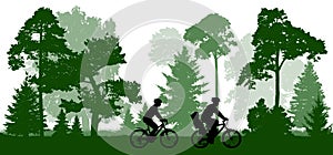 Family man, woman and child rides the bicycles in the park