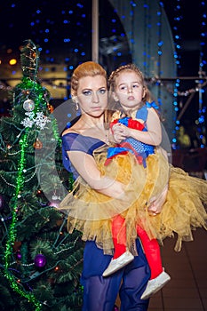 Family, x-mas, winter holidays and people concept - happy mother and little daughter