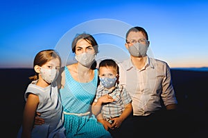 Family in masks during pandemia photo