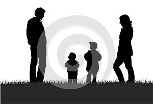 Family on meadow silhouette