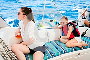 Family on board of sailing yacht