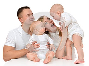 Family mother father with newborn child baby kids