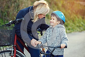 Family of mother and son biking