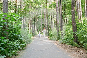 Family and nature concept - Mother and daughter spend time together outdoor