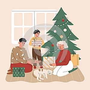 Family near the Christmas tree, gift boxes and cat. Father, mother and boy exchange gifts, xmas tradition